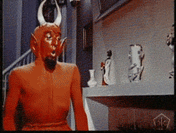 Santa Claus And Hiding Devil GIF