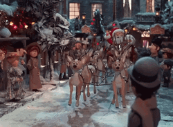 Santa Riding Reindeer Christmas Village GIF