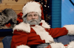 Santa Smiling And Being Serious GIF