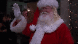 Santa Smiling While Waving GIF
