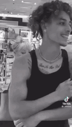 Sassy Cougar Checking Out Young Man GIF
