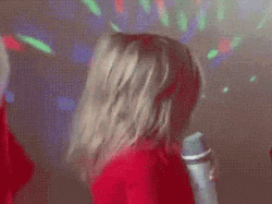 Sassy Little Girl Holding Microphone GIF