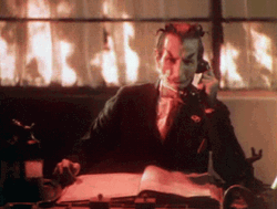 Satan Answering Phones In Hell GIF