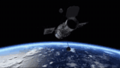 Satellite Flying Over Earth At Night GIF