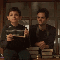 Satisfied Joe Goldberg Raising Hand GIF