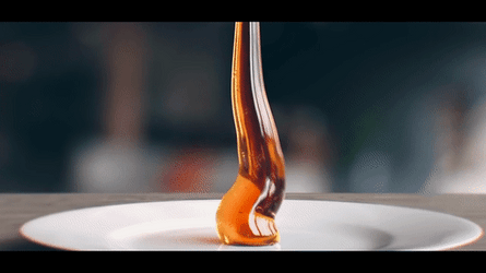 Satisfying Honey Being Poured On A Plate GIF