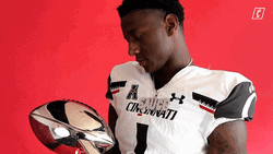 Sauce Gardner Looking At Silver Trophy GIF