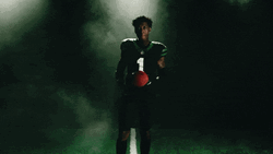 Sauce Gardner Tossing Football Between Hands GIF