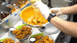 Saucing The Chicken Wing GIF