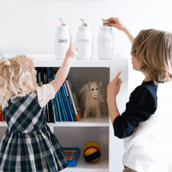 Save Money Kids Dropping Coins Into Jars GIF