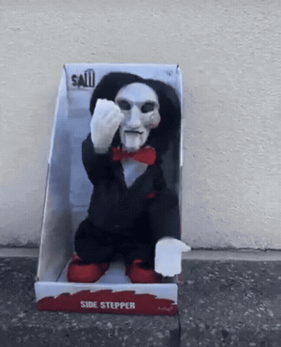Saw Side Stepper In Box On Sidewalk GIF