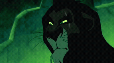 Scar From The Lion King Staring With Glowing Green Eyes GIF