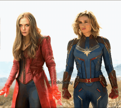 Scarlet Witch And Captain Marvel Standing Together GIF