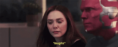 Scarlet Witch Laughing Next To Man With Red Mask GIF