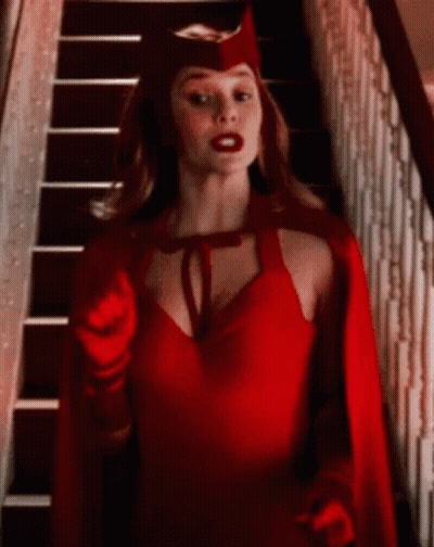 Scarlet Witch Woman Pointing At Camera On Stairs GIF
