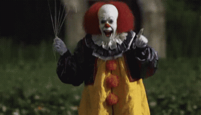 Scary Clown Holding Knife And Balloon GIF