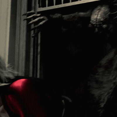 Scary Monster Standing In Dark Room GIF