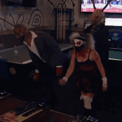 Scary Sexy Clown At Bar GIF