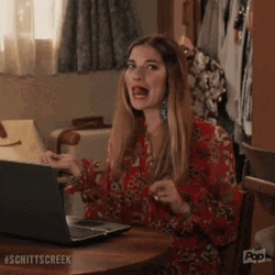 Schitt's Creek Annie Murphy Flip Hair GIF