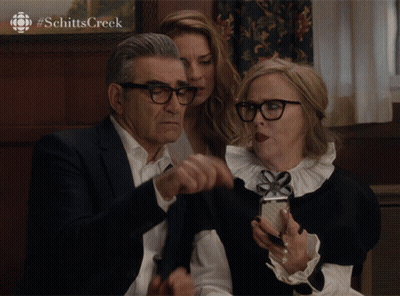Schitt's Creek Man and Two Women Looking