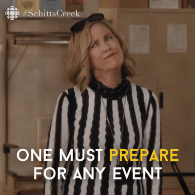 Schitt's Creek Poster Woman In Striped Shirt GIF