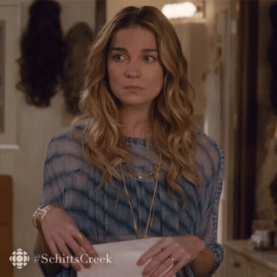 Schitt's Creek Woman Holding Purse GIF