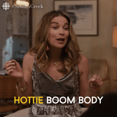 Schitt's Creek Woman Sitting On Bed Says Hottie Boom Body GIF