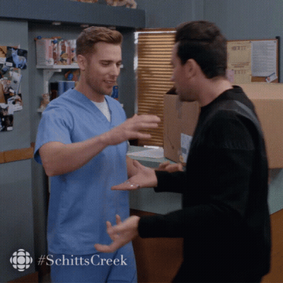 Schitts Creek Two Men Hugging GIF