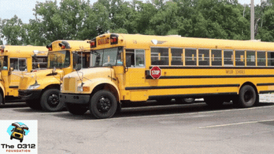 School Buses With Stop Sign GIF