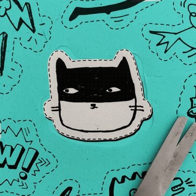 Scissors Cutting Cat Wearing Batman Mask GIF