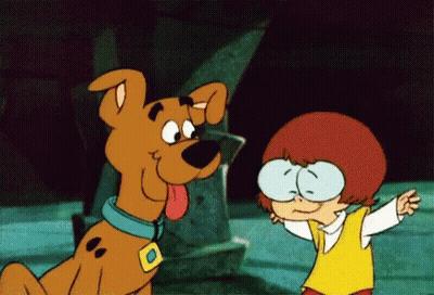 Scooby Doo And Boy With Glasses Standing Together GIF
