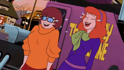 Scooby Doo And Daphne Are Laughing In Front Of A Purple Van That Says They Are Ne GIF