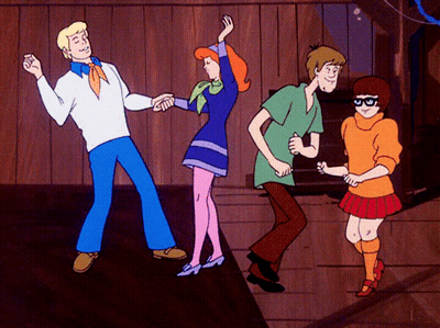 Scooby Doo And His Friends Are Dancing In A Cartoon GIF