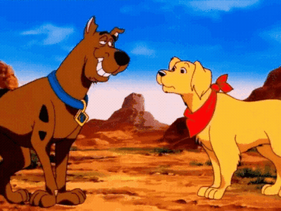 Scooby Doo And Yellow Dog In Desert GIF