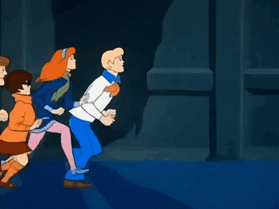 Scooby Doo Characters Running In Dark Room GIF