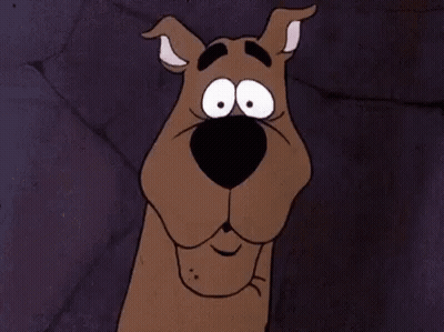Scooby Doo From The Scooby Doo Cartoon Is Making A Funny Face . GIF
