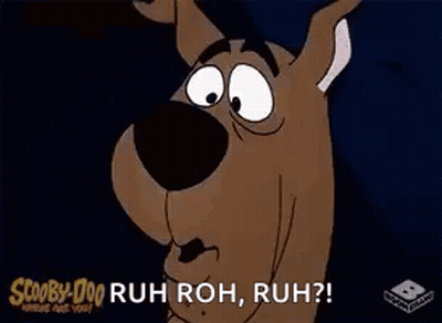 Scooby Doo Is Making A Funny Face And Saying `` Ruh Roh , Ruh '' . GIF
