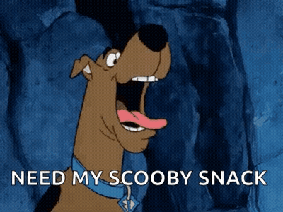 Scooby Doo Is Saying `` Need My Scooby Snack '' With His Mouth Open And His Tongue Out . GIF