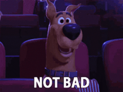 Scooby Doo Is Sitting In A Theater With The Words Not Bad Above Him GIF