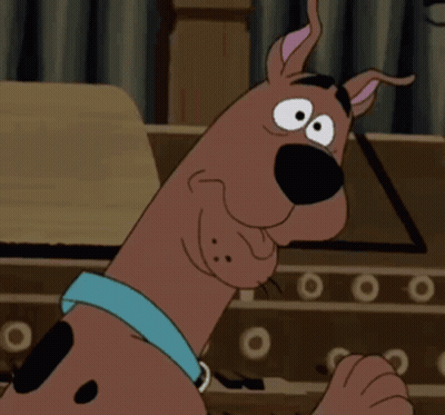 Scooby Doo Is Wearing A Blue Collar And Giving A Fist Bump GIF