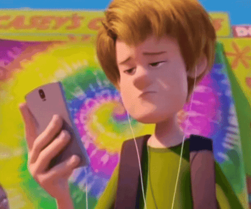 Scooby Doo Wearing Earbuds Looking At Phone GIF