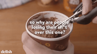 Scooping Ice Cream Into Cup Saying Top GIF