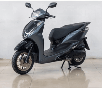 Scooter Parked On Tiled Floor GIF