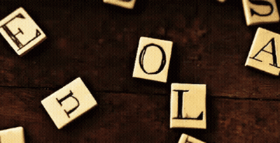 Scrabble Tiles With Letters E O L A GIF