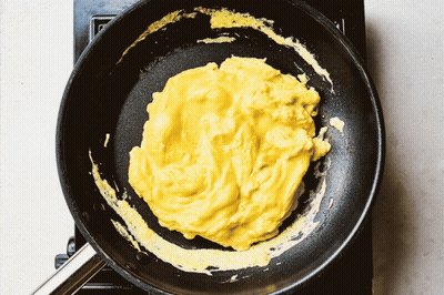 Scrambled Eggs Cooking In Frying Pan GIF