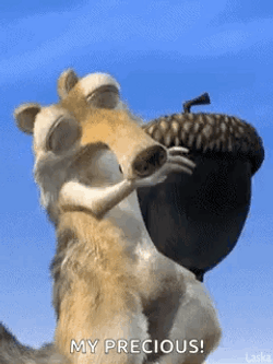 Scrat Rubbing Precious Acorn GIF