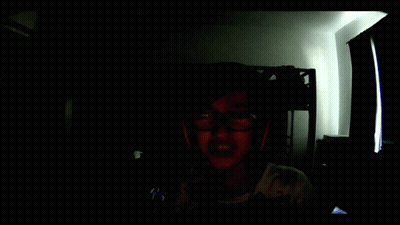 Screaming Boy In Dark Room With Glasses And Headphones GIF