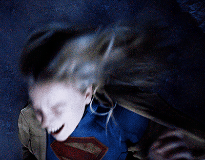 Screaming Woman In Superman Costume GIF