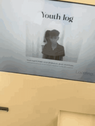 Screen With Man Woman And Youth Log GIF
