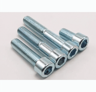 Screws Stacked On White Surface GIF